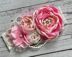 "A royal, incredibly stunning couture over the top headband made in different shades of light pink, blush, princess pink and cream. All handmade with satin singed flowers and rosettes, pearl strands, gemstones and rhinestones, pearls and glitter tulle. Lots of attention to detail.  The flower cluster measures approximately 6.5\"-8\" and is attached to a cream 2.5\" lace elastic headband. All my headbands are backed with felt for a softer feel and a firmer hold. You just have to see this to belie Tutu Top, Kids Headband, Fabric Flower Headbands, Dress Tutu, Kids Headbands, Flower Cluster, Birthday Outfits, Elastic Headband