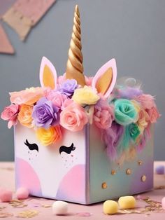 a unicorn - like box with flowers on it