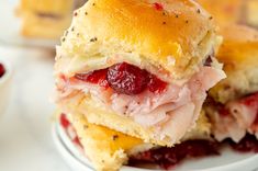 These Cranberry Turkey Sliders channel all of the fall vibes with warm bread, melty cheese, and bright cranberry sauce!