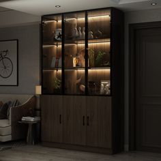 a living room filled with furniture next to a wall mounted bike on top of a wooden shelf