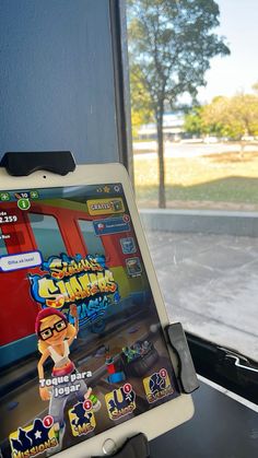 a tablet computer sitting on top of a table