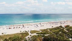 an aerial view of the beach and ocean