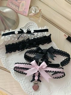 Elevate your lingerie collection with our black floral design sweet bowknots lace garter. This delicate and feminine garter features a charming floral design and sweet bowknots, adding a touch of romance to any outfit. The lace detailing exudes a sense of elegance and allure, making it a perfect choice for special occasions or to simply add a hint of glamour to your everyday wear.  Please note that this product includes only one garter.  Garment Size   	 		 			Size 			S 			M 		 		 			Thigh 			32 Garters Aesthetic, Irl References, Thigh Garter, Steampunk Fashion Female, Pink And White Weddings, Tech Wear, White Floral Design, Steampunk Accessories, Lace Garter