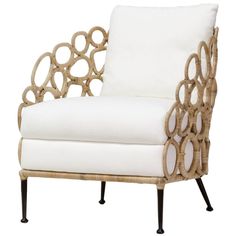 a chair made out of wicker and white fabric