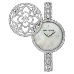 An unmistakable Louis Vuitton diamond watch showcasing a plethora of round brilliant cut diamonds 485, and one flower shaped diamond centrally located. 6.7ct TW This special and complicated designed diamond has more facets than a traditional round brilliant cut diamond which reveals additional brilliance. The watch case and band are constructed of 18k white gold, and the secret compartment reveals the mother of pearl dial adorned with 4 round brilliant cut diamonds. White Gold Diamond Bracelet, Gold Diamond Watches, Trust Fund, Louis Vuitton Jewelry, Secret Compartment, Bracelets Gold Diamond, Rose Gold Case, White Gold Diamond Rings, Fabulous Jewelry