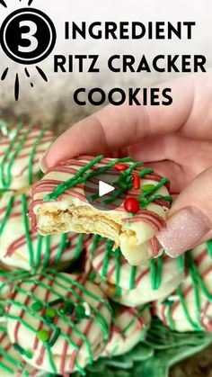 someone is holding some kind of cracker cookies with green and red sprinkles