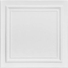 a white square frame on the wall