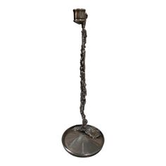 a metal object with chains hanging from it's end on a white background,