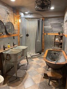 an old fashioned bathroom with two sinks and a tub in the middle of the room