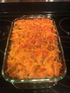 a casserole dish sitting on top of an oven