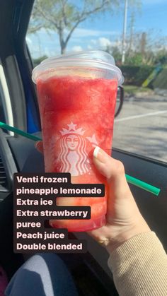 a person holding up a drink in their hand with the caption that reads, venti frozen pineapple lemonade extra strawberry pure juice peach juice double blended