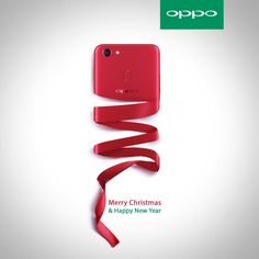 an advertisement for oppo's merry christmas and happy new year phone with red ribbon