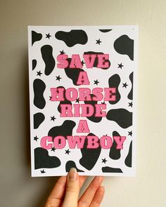 Wall gallery art print with a black and white cow print background and bold pink text reading, “Save A Horse Ride A Cowboy”. Design For Slogan Ideas Border Easy, Yee Haw Painting, Country Canvas Painting Easy, Country Things To Paint, Cowgirl Canvas Painting, Cowgirl Painting Ideas, Cowboy Painting Ideas, Country Canvas Painting, Save A Horse Ride A Cowboy