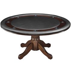 a wooden table with black leather top