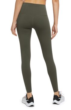 Signature Dri-FIT technology keeps you comfy and dry in second-skin leggings featuring multiple side pockets to keep small essentials secure while on the go. 27" inseam; 11" rise (size Small) Zip pocket Drop-in pockets Dri-FIT moisture-wicking technology 68% nylon, 32% elastane Machine wash, tumble dry Imported Nike High Stretch Moisture-wicking Bottoms, Nike Moisture-wicking High-stretch Bottoms, Nike Functional Gym Bottoms, Functional Nike Gym Bottoms, Nike Stretch Nylon Bottoms, Nike Moisture-wicking Tights For Training, Nike Moisture-wicking Training Tights, Nike Compression Moisture-wicking Activewear, Nike Compression Activewear With Moisture-wicking