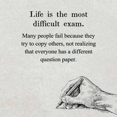 a hand holding a pen writing on paper with the words life is the most difficult exam many people fail because they try to copy others, not realizing that everyone has a