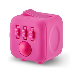 a pink toy that is shaped like a cube with four knobs on each side