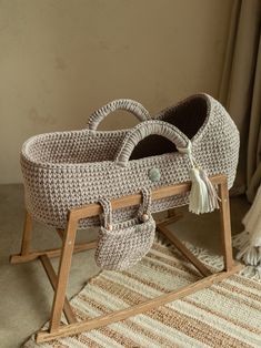 a baby's pram is shown on the floor next to a rug and window