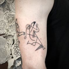 a person with a tattoo on their arm