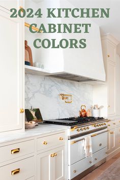 a kitchen with white cabinets and gold pulls on the hood, is featured in this magazine