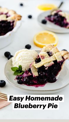 an easy homemade blueberry pie on a white table with lemons and ice cream