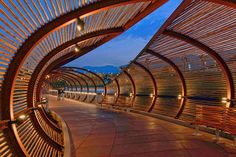 the walkway is lined with wooden slats