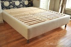 the bed frame is made up and ready to be used as a headboard or foot board