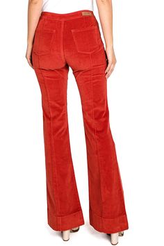 High-rise, slim-fit corduroy flares with retro pin tuck seams down the center. Comfortable and stretchy. Classic zip fly and button closure with pockets on the back. Looks great dressed up with heels and a crop knit! CARE | Machine Wash Cold Inside Out CONTENTS | 98% Cotton, 2% Spandex MEASUREMENTS | 43"/109 cm Top to Bottom 33"/84 cm Inseam 10"/25 cm Rise (Size 26/3) MODEL | 5'8 - wearing a size 26/3 IMPORTED Hippie Flare Pants, Corduroy Bell Bottoms, Corduroy Flares, Coral Outfit, Black Clothes, Just Style, Bright Spring, Inspo Outfit, 2022 Fashion