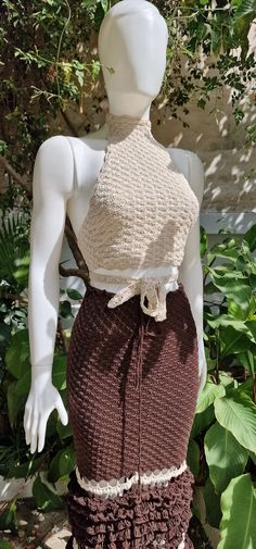 Two-piece ensemble consisting of a crocheted skirt and top. It was handmade with high quality yarns. The crochet set is adjustable and can fit sizes S-M-L. The top can also be worn over a long-sleeved shirt. Whether it's a wedding or a beach party, this set is the perfect outfit. Care Machine washable below 40o degrees. Hand wash is best. Do not bleach 2 Piece Crochet Outfit, Crochet Fashion Dresses, Crochet Long Top, Colorful Skirt Outfits, Crochet Two Piece Outfit, Crochet Set Outfit, Crochet Shirt Outfit, Long Crochet Skirt, Crochet Skirt And Top