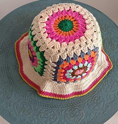 **These colorful granny square crochet bucket hats are the perfect unique accessories for any season. One of them will be the perfect complement to your outfits. You are sure to want to wear it all the time and get compliments every time you wear it. Completely unique and handmade. **The hats are flexible and come in standard sizes. **A perfect gift option for your loved ones **Made from high quality yarns (55% cotton, 45% polyacrylic) **Hand wash recommended, but you can also machine wash (hand Crochet Granny Square Hat, Granny Square Bucket Hat, Granny Square Hat, Colorful Granny Square, Crochet Bucket Hats, Bucket Hat Crochet, Hippie Hat, Hats Summer, Festival Hat