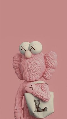 a pink teddy bear holding a purse with two eyes on it's face and nose