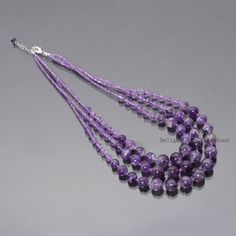 "PRODUCT DETAIL : ITEM : PURPLE AMETHYST BEADED NECKLACE ITEM CODE : DGC3037 ITEM NAME :NECKLACE GEMSTONE : PURPLE AMETHYST BEADS SHAPE : SMOOTH ROUND LENGTH : 17\"-19\" INCH APPROX BEADS SIZE: 3mm/6-12 MM Approx WEIGHT : 431 Cts. APPROX CUSTOMIZATION/BULK ORDER : AVAILABLE PLEASE FEEL FREE TO CONTACT IF YOU REQUIRE ANY FURTHER INFORMATION." Lavender Round Beads Spiritual Necklace, Purple Amethyst Necklace With 8mm Beads, Healing Amethyst Necklaces With Polished Beads, Healing Amethyst Necklace With Polished Beads, Amethyst Beaded Necklaces With Round Beads For Gifts, Purple Necklaces With 8mm Beads For Healing, Amethyst Gemstone Beads For Jewelry Making, Amethyst Round Beads Lavender Necklace, Amethyst Beaded Necklace For Gifts