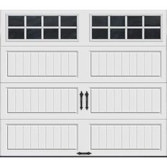 a white garage door with windows and bars on the top, against a white background