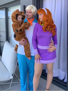 the man and woman are dressed up as characters from disney's animated movie, scooby