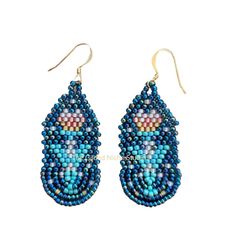 Shades of teal, green and blue make these unique earrings stand out.  Reminiscent of a medieval tapestry, a pink tulip emerges from a sea of teal.  Making earrings is my passion. Each bead is carefully hand selected and woven with love and happiness. I hope you feel the same when you wear a pair of them, too. Features: Gold plate ear wires. Woven with micro-fused braided bead thread for extreme durability. Superior Japanese glass seed beads for exceptional quality and durability. Each bead woven with positive energy and love just for you. Dimensions: 1.75 inches length x 0.75 inches wide Tulip Beaded Earrings, Teal Beaded Earrings, Handmade Blue Heart-shaped Beaded Earrings, Artisan Multicolor Hand-strung Beaded Earrings, Multicolor Flower-shaped Beaded Earrings, Medieval Tapestry, Earring Stand, Shades Of Teal, Artisan Earrings