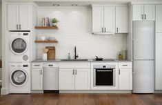 the kitchen is clean and ready to be used as a washer and dryer