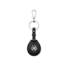 a black keychain with a white logo on the front and bottom part of it