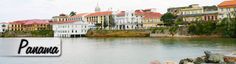 there is a sign that says panauo in front of some buildings on the water