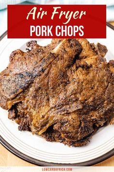 air fryer pork chops on a plate with text overlay that says air fryer pork chops