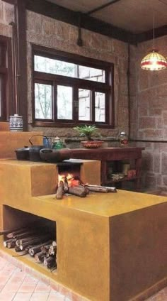 a fire place in the middle of a room