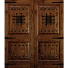 two wooden doors with metal handles and knobs