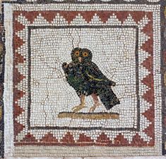 an image of a bird on a mosaic