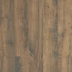 wood flooring that looks like it has been painted in brown and is very rustic