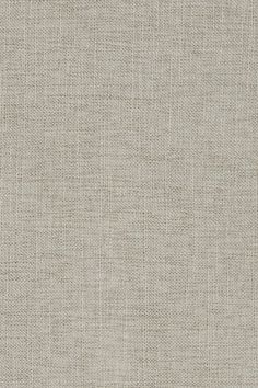 an upholstered fabric textured in light grey