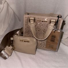 Brand New Steve Madden Hand Bag/ Crossbody Bag Color: It’s More Like A Beige Blush Nude With Rhinestones Really Cute For The Holidays, In You Have Any Questions Feel Free To Ask Me, Open To Offers Thank You Steve Madden Purse Handbags, Steve Madden Bags Handbags, Steve Madden Handbags, Steve Madden Purse, Cross Shoulder Bags, Pink Crossbody Bag, Steve Madden Bags, Victoria Secret Bags, Crossbody Tote Bag