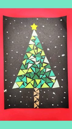 a christmas tree made out of construction paper