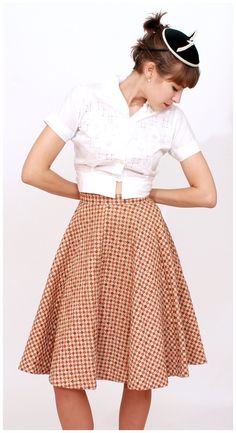 S T R A I G H T T A L K ▲ Circa: 1950s ▲ Tag: Carole Chris of California ▲ Material: Cotton ▲ Condition: Very Good D E T A I L S ▲ Checkered brown circle skirt in a sturdy quilted cotton ▲ Brown, beige and orange checkerboard/diamond pattern ▲ Button and covered zipper to side of waist ▲ Defined waistline with full circle skirt C O N D I T I O N ▲ Very Good S I Z I N G ▲ Would probably best fit a size XS best Waist: 23-24 inch Hips: free Waist to hem (skirt length): 24 inch FOLLOW US ON INSTAGRA Full Circle Skirt, Full Circle Skirts, Hem Skirt, Wiggle Dress, Full Circle, Womens Skirts, Fashion Line, Circle Skirt, Small Waist