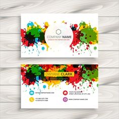 two business cards with colorful paint splatters on them