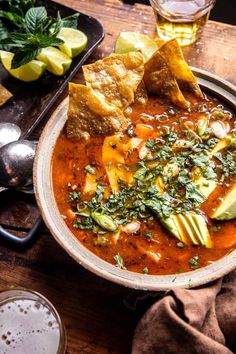 Salsa Verde Tortilla Soup: Made with a variety of vegetables, seasonings, chunky red salsa, smoky salsa verde, and plenty of toppings!