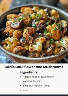 a bowl filled with cauliflower and mushrooms on top of a table next to other foods